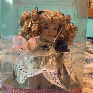 Animated wind up musical porcelain doll in box vintage